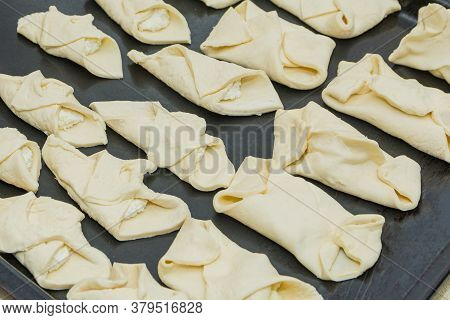 Cottage Cheese Rolls Made From Raw Puff Pastry, Prepared For Baking