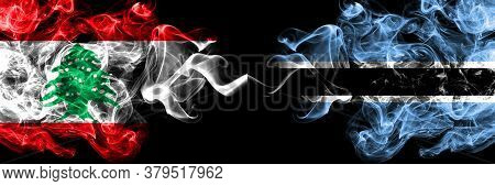 Lebanon Vs Botswana, Botswanan Smoky Mystic Flags Placed Side By Side. Thick Colored Silky Abstract 