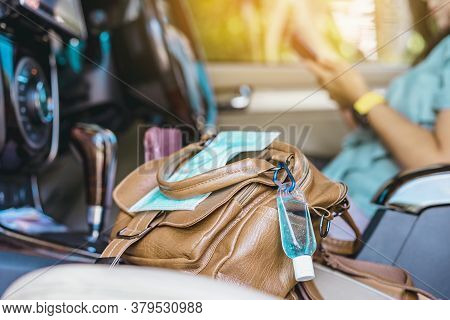 Mini Portable Alcohol Gel Bottle To Kill Corona Virus(covid-19) Hang On A Leather Shoulder Bag Of A 