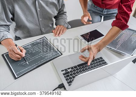 Two Professional Programmer Cooperating And Working On Web Site Project In A Software Developing On 