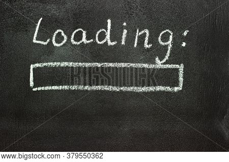 The Loading Process Is Shown In White On A Chalkboard. Stop Motion Animation. Black Background