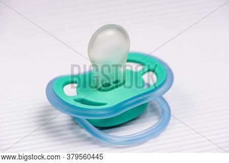 Blue Pacifier Isolated On White Background. Pacifiers Colored Pacifiers