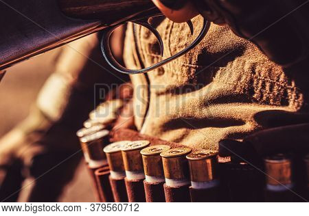 The Man Is On The Hunt. Ammunition Bullet. Male Hunter Ready To Hunt With Hunting Rifle. Close Up Am
