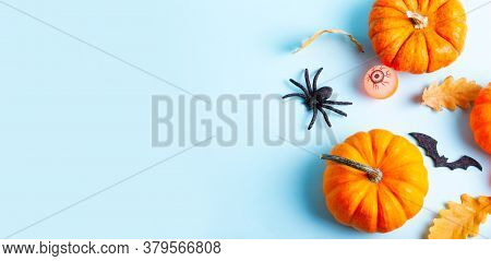 Orange Halloween Pumpkins Border On Blue Background Flat Lay Benner With Copy Space