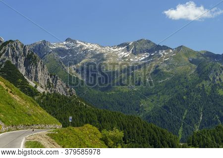 View Of Breno, Brescia, Lombardy, Italy, From The Road To Crocedomini Pass At Summer. Mountain Lands