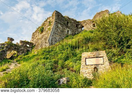 Khust City, Western Ukraine - July 29, 2020: Ruins Of Old Hungarian Castle At Sunset.