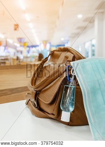Mini Portable Alcohol Gel Bottle To Kill Corona Virus(covid-19) Hang On A Leather Shoulder Bag Of A 