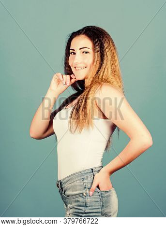 Extra Volume. Styling Cosmetic Product. Crimped Hairstyles. Woman Stylish Hairstyle On Blue Backgrou