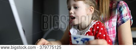 Woman With Child At Home Enter Credit Card Online. Accustom To Financial Literacy. Optional Payments
