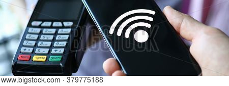 People Hold Portable Terminal And Smartphone. Payment By Contactless Means During Quarantine. Non-co