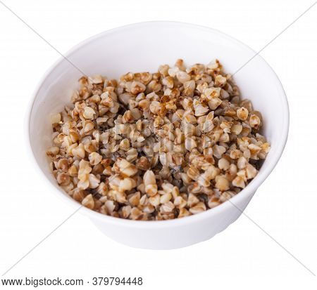 Buckwheat In Wjite Plate Isolated On White Background. Buckwheat Top View. Healthy Food. Veretian Fo