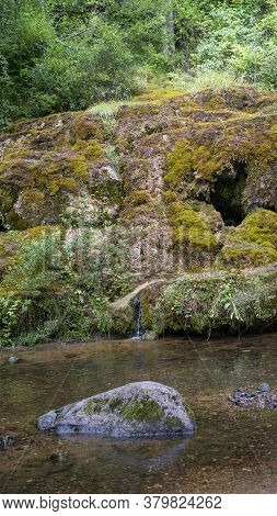 Waterfall At City Rauna, Latvia. River With A Rocky Bottom And Rauna Staburags Cliff. A Unique Rock 