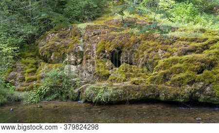 Waterfall At City Rauna, Latvia. River With A Rocky Bottom And Rauna Staburags Cliff. A Unique Rock 