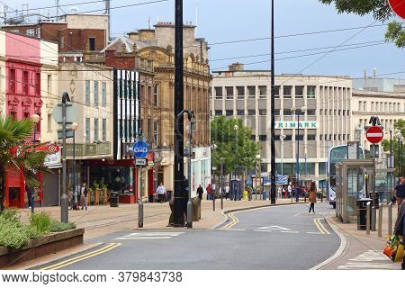 Sheffield, Uk - July 10, 2016: People Visit High Street Shopping Area In Sheffield, Yorkshire, Uk. S