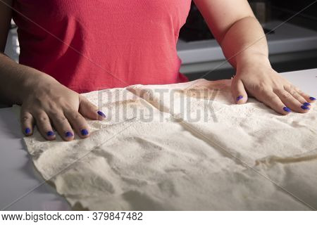 Girls Hands Prepare Pita Bread In A Gray Kitchen On A White Table Top. Cooking Process