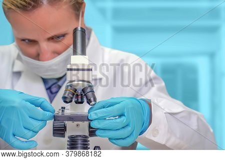 Scientist Woman Looks At Test Sample For Microscope. Medic Researcher Using Microscope. Medical Tech