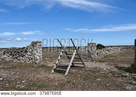 Wooden Stile By Dry Stone Walls At Stora Alvaret, An Unique Landscape On The Swedish Island Oland