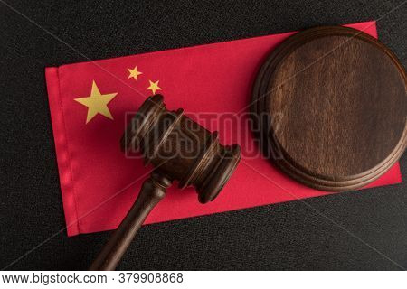 Judge Gavel On The China Flag. Law And Legality In Prc. Violation Of Human Rights.