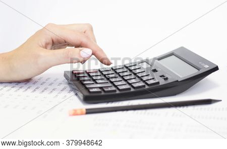 Closeup Business Woman Hand Using A Calculator With Red Pencil In Cafe Office. Business Finance And 