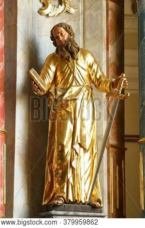 PLESIVICA, CROATIA - JULY 22, 2013: Saint Paul, statue on the high altar at Saint George Parish Church in Plesivica, Croatia