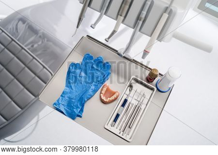 Close Up Dental Tools, Stomatological Instruments In Dentists Modern Stomatology Clinic. Model Maxil