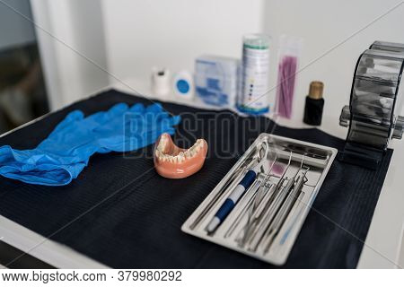 Close Up Dental Tools, Stomatological Instruments In Dentists Modern Stomatology Clinic. Model Maxil