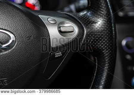 Novosibirsk/ Russia - August 01  2020: Infiniti Fx, Car Controller On Steerling Wheel ,music,control