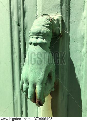 Old And Ancient Knocker In The City Of Ars-en-re