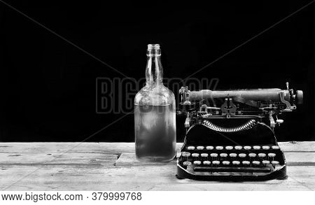 Antique Portable Typewritter Made In 1917 With Whisky Bottle With Room For Your Type In Black And Wh