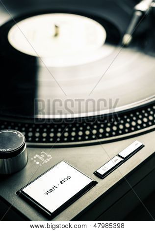Bouton marche-arrêt façonné de vieux tourne-disque