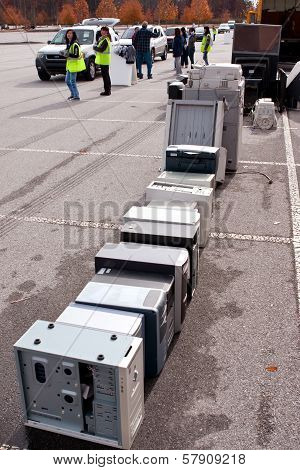 Volunteers Stack Computers At County Recycling Event