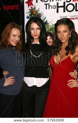 Erin Cummings and Julia Voth with America Olivo   at the Los Angeles Premiere of 'Nothing Like The Holidays'. Grauman's Chinese Theater, Hollywood, CA. 12-03-08