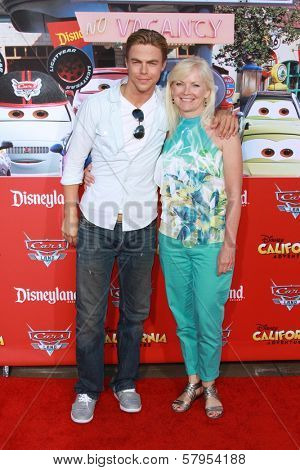 Derek Hough and mother Marriann Nelson at the Grand Opening of 