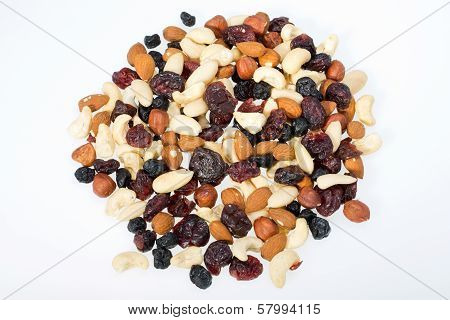mixed nuts and dried fruits isolated on white background