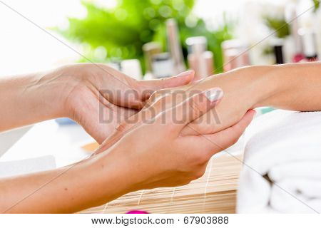 Close up of process of hand massage at beauty salon
