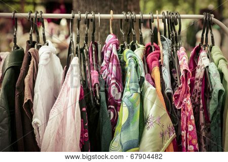 Clothes On A Rack On A Flea Market