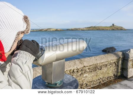 Woman Looking To Dalkey Island By Binoculars
