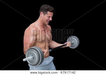 Shouting crossfitter lifting up heavy barbell on black background