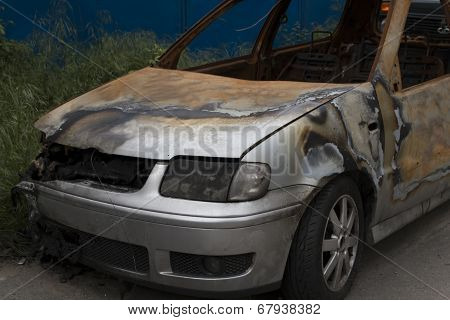 Wrecked And Burning Car Close Up
