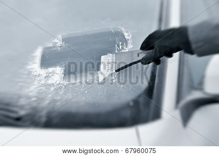 Winter driving - Scraping ice from a windshield