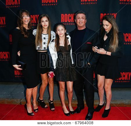 NEW YORK-MAR 13: Jennifer Flavin (L), Sylvester Stallone (2nd R) and daughters Sophia, Sistene, and Scarlet attend 'Rocky' Broadway opening night at Winter Garden on March 13, 2014 in New York City.