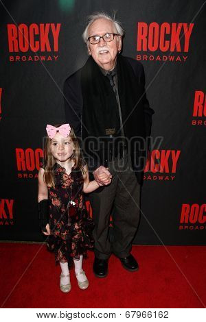 NEW YORK-MAR 13: Writer Thomas Meehan (R) and granddaughter Emma attend the 'Rocky' Broadway opening night after party at Roseland Ballroom on March 13, 2014 in New York City.