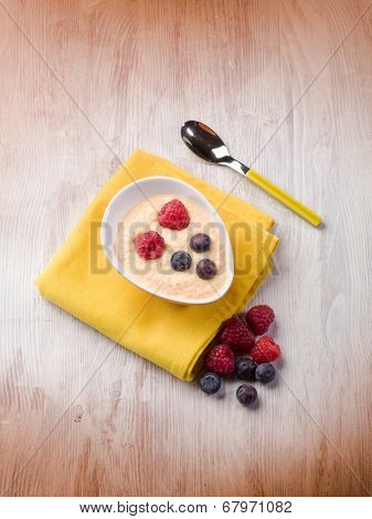orange sorbetto with blueberry and raspberry