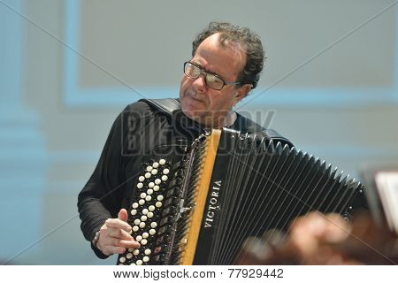 NOVOSIBIRSK, RUSSIA - DECEMBER 8, 2014: French accordionist Richard Galliano on the rehearsal during the festival Classics. The event joins the concert of the World music stars