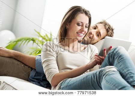 Couple Surfing The Net At Home
