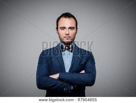Sharp dressed fashionist wearing jacket and bow tie