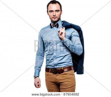 Sharp dressed fashionist with jacket over shoulder 