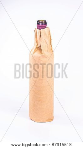 isolation one bottle wrapped in paper