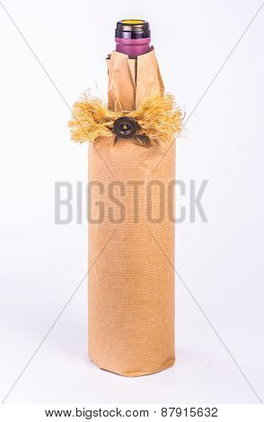 one bottle wrapped in paper with decoration
