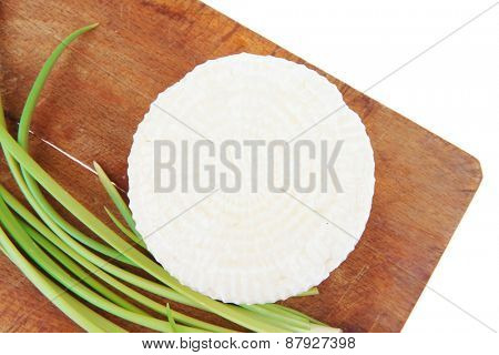 dairy products : feta white cheese on cut board isolated over white background